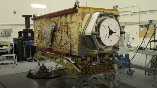 OCO-3 sits on the large vibration table (known as the 'shaker') in the Environmental Test Lab at the Jet Propulsion Laboratory.