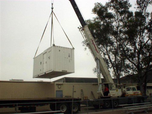 This image shows a crane lifting the Darwin Fourier Transform Spectrometer as it gets ready to leave California.